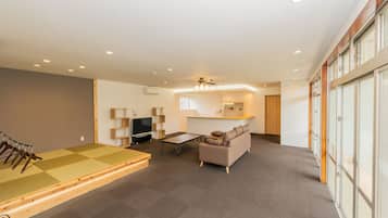 Apartment, 2 Bedrooms | Living area | Flat-screen TV, DVD player