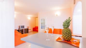 Apartamento | Área de estar | TV de tela plana