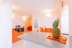 Apartment | Living area | Flat-screen TV - Apartments On European Square (Kyiv)