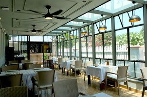 Breakfast, lunch, dinner served; local and international cuisine 