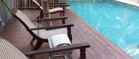 Outdoor pool, pool loungers