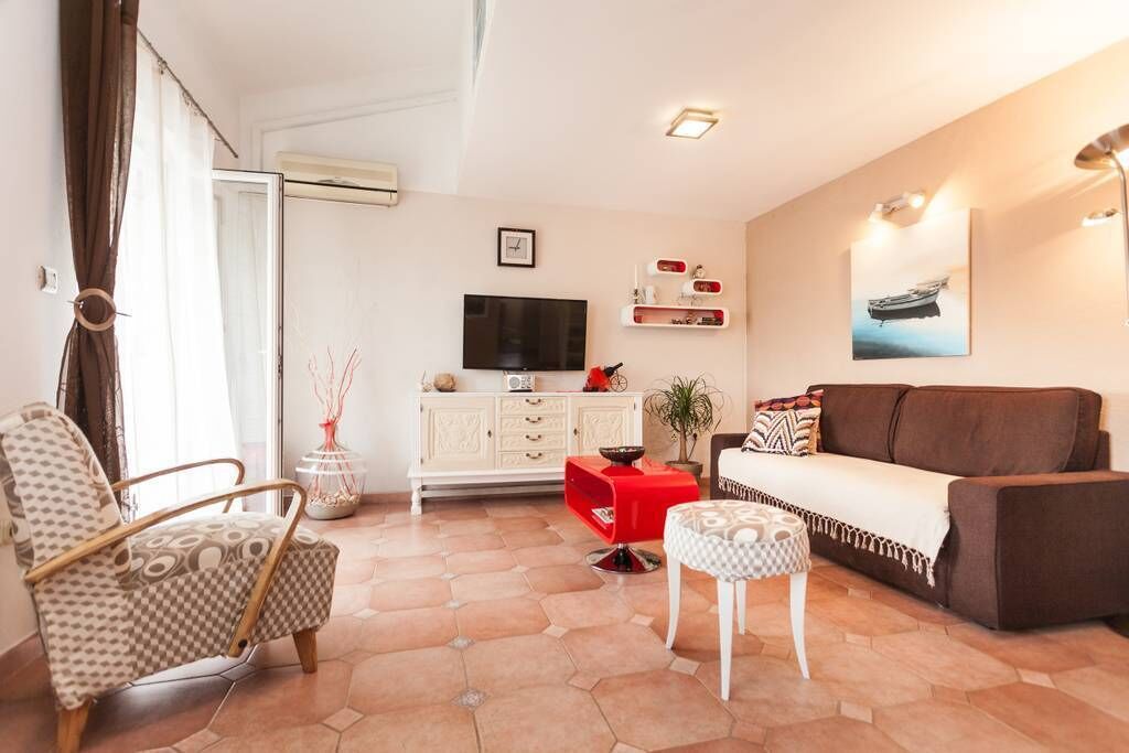 Apartment, 1 Bedroom | Living room | Flat-screen TV