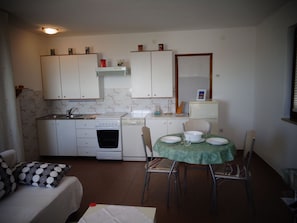 Studio (ST3) | Private kitchenette | Fridge, stovetop, cookware/dishes/utensils - Nice Studio apartments Eduard (Medulin)