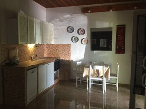 Apartment, 2 Bedrooms | Private kitchen | Fridge, stovetop, cookware/dishes/utensils