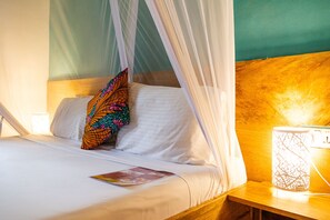 Quadruple Room | Premium bedding, minibar, blackout drapes, iron/ironing board - Pili Pili House (Jambiani)