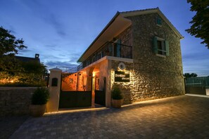 Front of property - evening/night