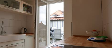 Duplex | Private kitchen | Full-size fridge, stovetop, dishwasher, coffee/tea maker