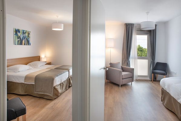 Coffres-forts dans les chambres, Wi-Fi gratuit, draps fournis