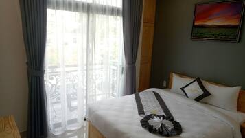 Deluxe Double Room | Minibar, in-room safe, desk, blackout curtains