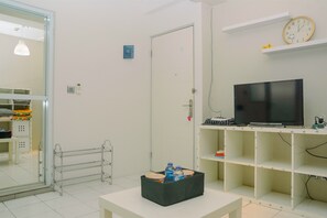 Habitación | Baño | Regadera y toallas