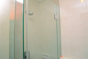 Room | Bathroom | Shower, towels - Strategic Studio Apartment at Capitol Park Residence (Jakarta)