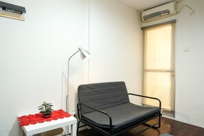 Room | 3 bedrooms, desk, iron/ironing board, free WiFi - Comfy 3BR Apartment at Mediterania Gajah Mada (Jakarta)