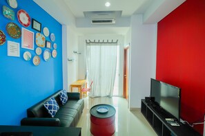 Room | Living area | TV - Minimalist 2BR Apartment at Springhill Terrace Residence (Jakarta)