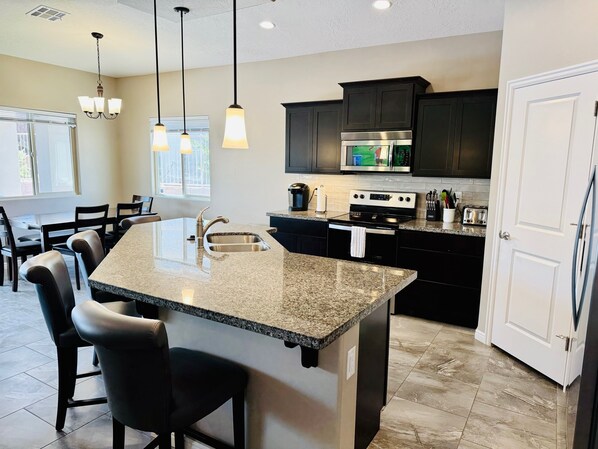 Fridge, microwave, oven, stovetop - Nevada Nights Villa by Mesquite Vacation Rentals with Putting Green & Pool! (Mesquite)