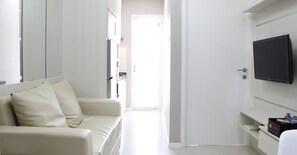 Room | Living area | TV - Luxurious 1BR Apartment @ Parahyangan Residence (Bandung)