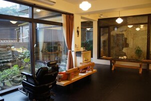 Quadruple Room with Garden View | Desk, free WiFi, bed sheets