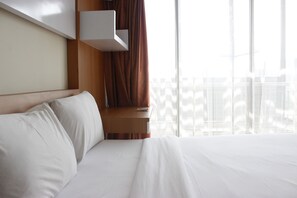 Room | Desk, free WiFi, bed sheets - Cozy Studio Apartment at Beverly Dago Residence (Bandung)