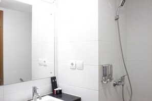 Habitación | Baño | Ducha y toallas