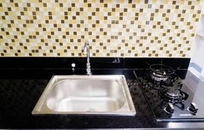Bathroom sink - Comfy Studio Apartment at Anderson Tower Supermall Mansion (Surabaya)