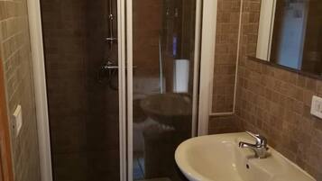 Shower, eco-friendly toiletries, hair dryer, bidet