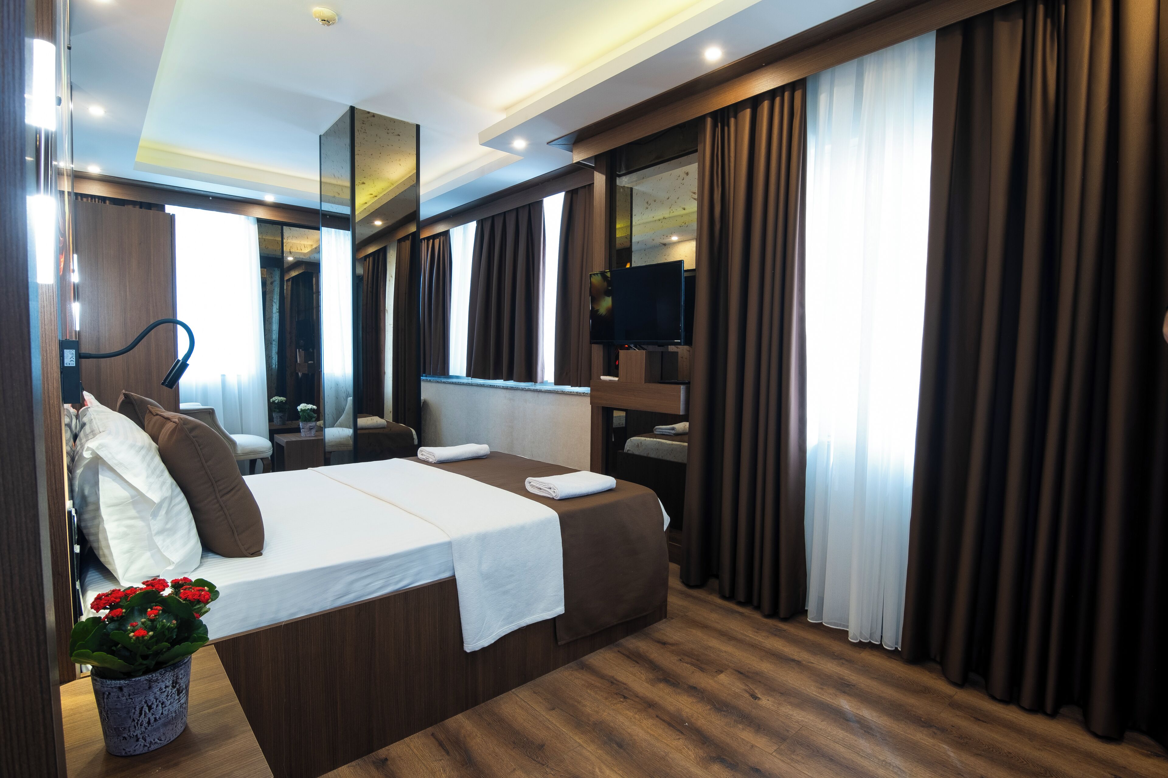 Habitació Deluxe | Roba de llit d'alta qualitat, minibar i escriptori 
