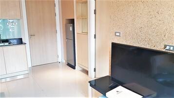 Apartment | Living area | 30-inch TV with digital channels