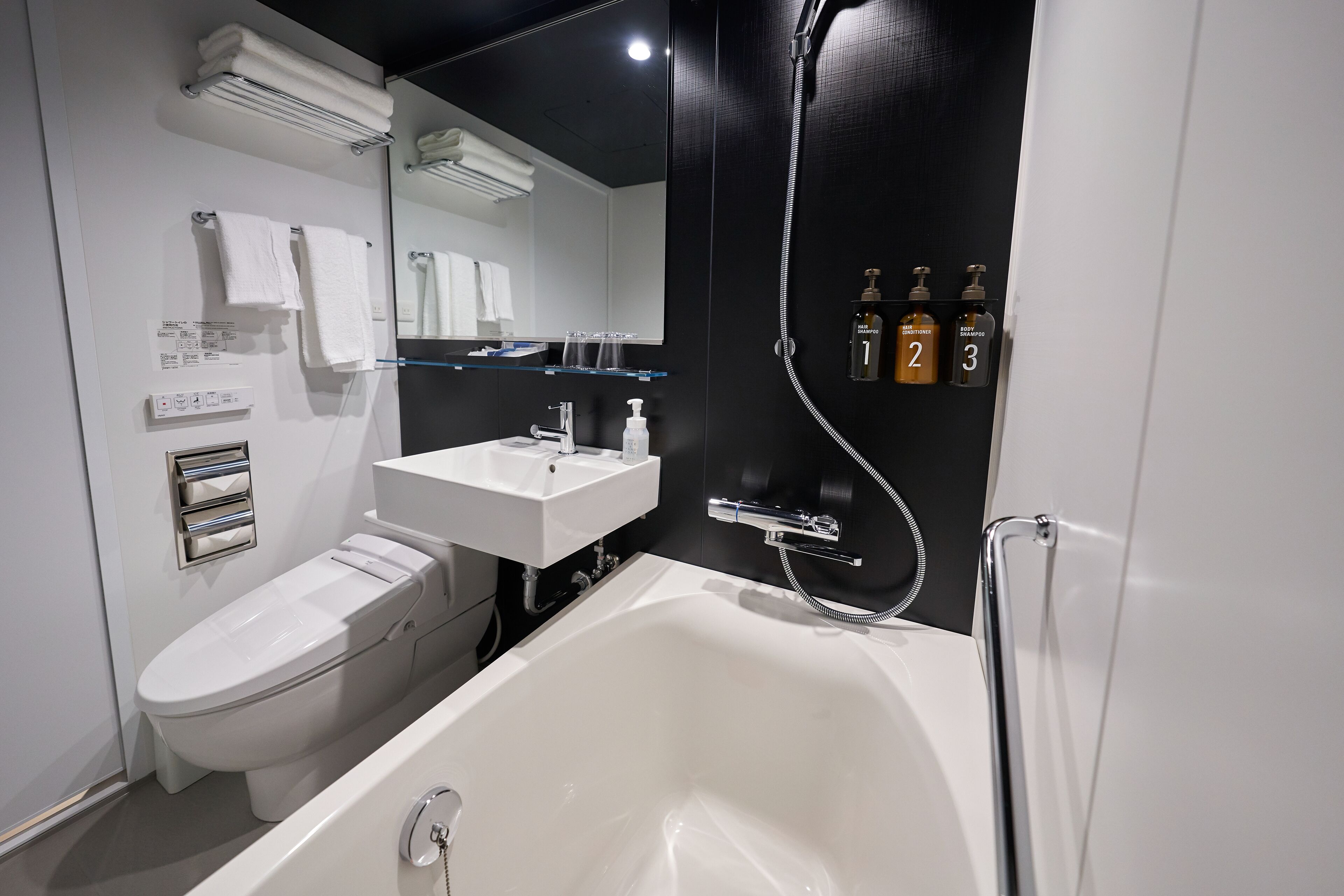 combined shower/bathtub, deep-soaking bathtub, free toiletries