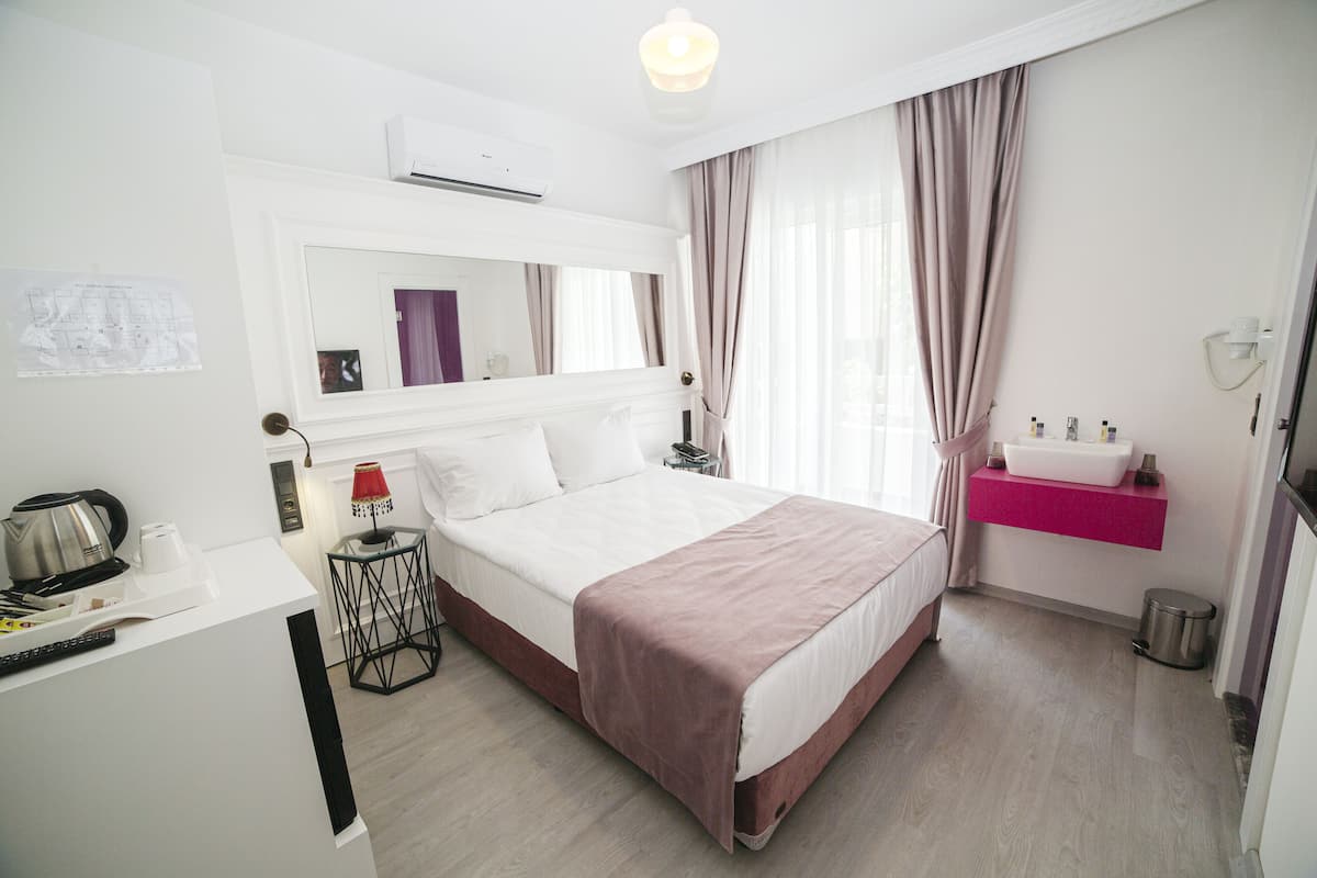 Couette en duvet d'oie, minibar, coffres-forts dans les chambres