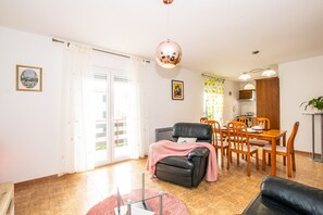 Apartment, 2 Bedrooms | Living area | Flat-screen TV
