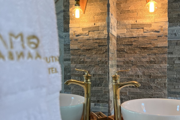 Separate bathtub and shower, free toiletries, hair dryer, bathrobes