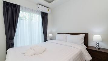 3 bedrooms, blackout curtains, iron/ironing board, travel cot