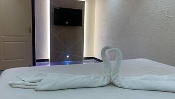 Premium bedding, desk, soundproofing, iron/ironing board