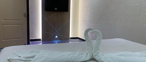 Premium bedding, desk, soundproofing, iron/ironing board