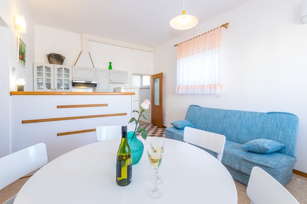 Standard Apartment | Living area | Flat-screen TV