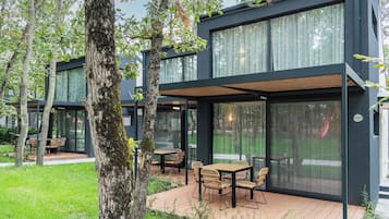Experience the perfect blend of modern design and natural surroundings in this contemporary residential building.
