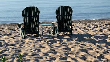 On the beach, sun-loungers