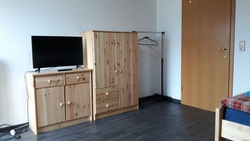 Apartment, 4 Bedrooms, Balcony (Dachgeschoss) | Living area | Flat-screen TV