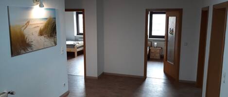 Apartment, 4 Bedrooms, Balcony (Dachgeschoss) | Living area | Flat-screen TV