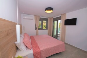 2 habitaciones, caja de seguridad en la habitación y escritorio