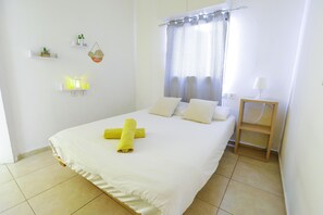 1 habitación, tabla de planchar con plancha, wifi gratis y ropa de cama 