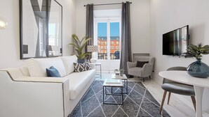 Apartment, 1 Bedroom | Living room | 32-inch flat-screen TV with cable channels, TV - Apartment 1Bd With Balcony in Plaza Mayor Square. Plaza Mayor I (Madrid)