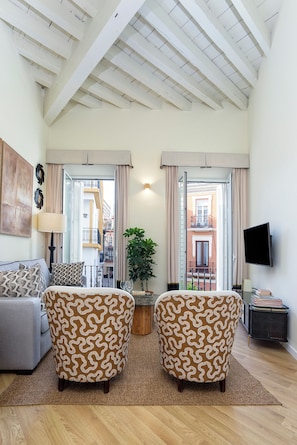 Apartment (2 Bedrooms) | Living area | 32-inch TV with cable channels