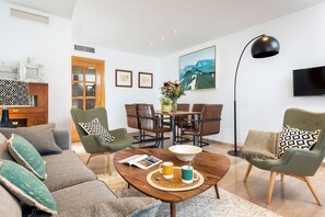 Apartment (3 Bedrooms) | Living area | 32-inch TV with cable channels