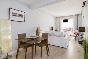 Apartment, 1 Bedroom | Living room | 32-inch TV with cable channels - Cozy & Confortable Apartment in Perfect Location. Santa Marta (Seville)
