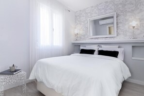 Apartment, 1 Bedroom | 1 bedroom, iron/ironing board, free WiFi, bed sheets - Cozy & Confortable Apartment in Perfect Location. Santa Marta (Seville)