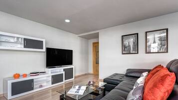 Apartment (2 Bedrooms) | Living area | 32-inch TV with cable channels