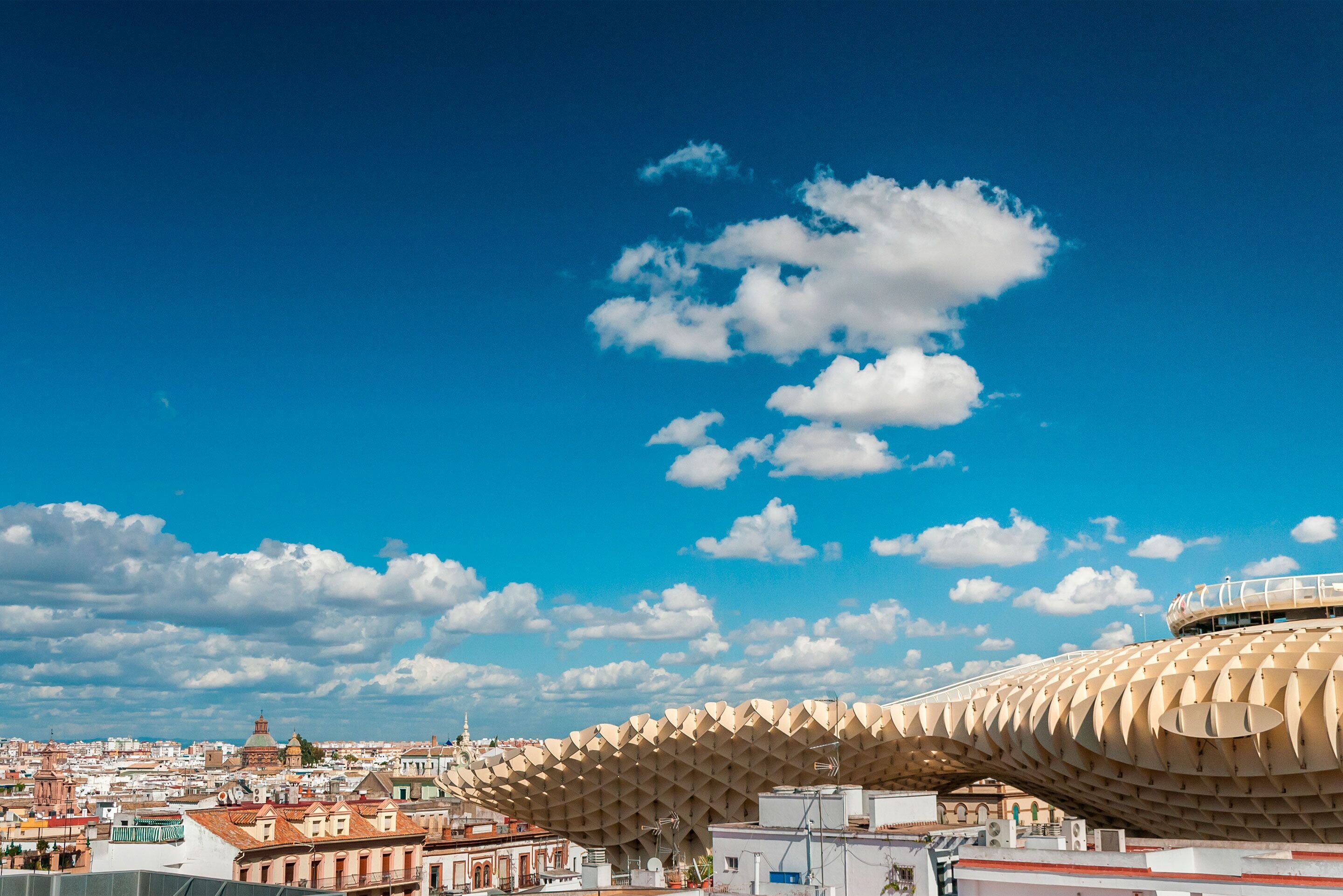 A cityscape with a distinctive modern architectural structure.