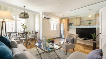 Apartment (2 Bedrooms) | Living area | 32-inch flat-screen TV with cable channels, TV