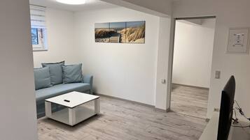 Apartment, 1 Bedroom (Souterrain; incl. EUR 35 cleaning fee) | 1 bedroom, blackout curtains, soundproofing, iron/ironing board