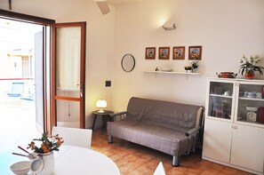 Apartment, 1 Bedroom | Living area | LCD TV